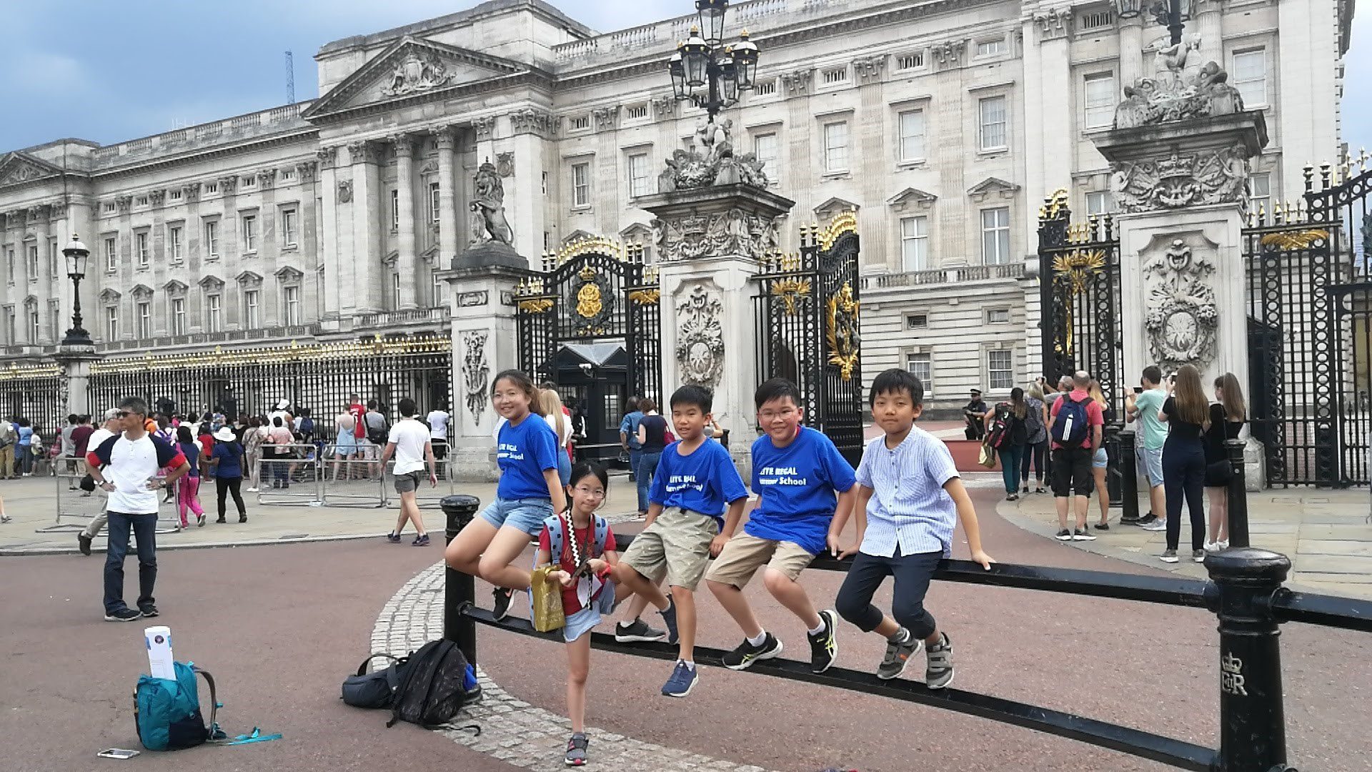 summer camp kids outside Buckingham Palace